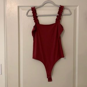 Vestique body suit size medium